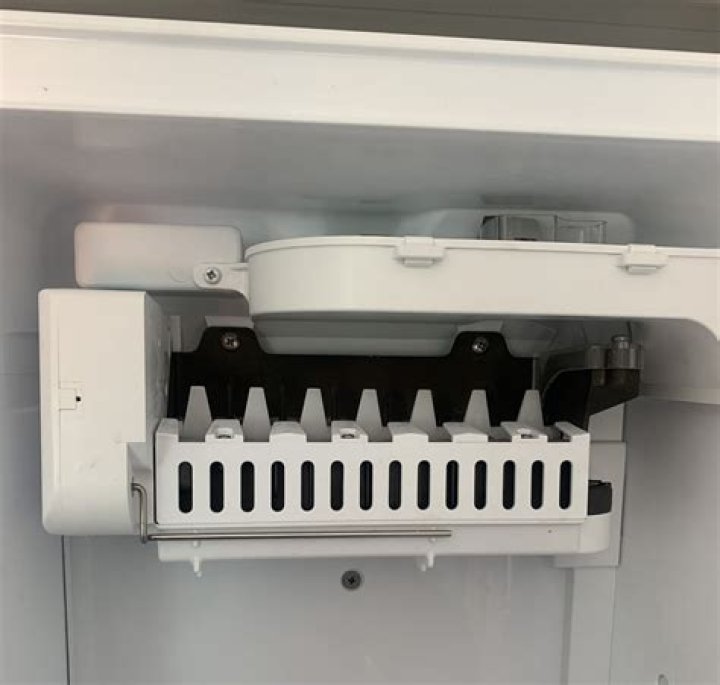 How do I reset my Kenmore ice maker?
