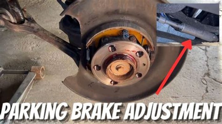 How do you adjust the parking brake on a Mustang?