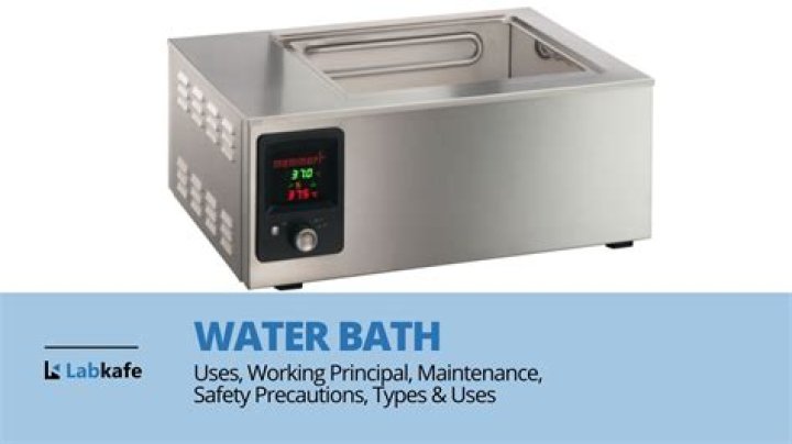 How do you clean a lab water bath?
