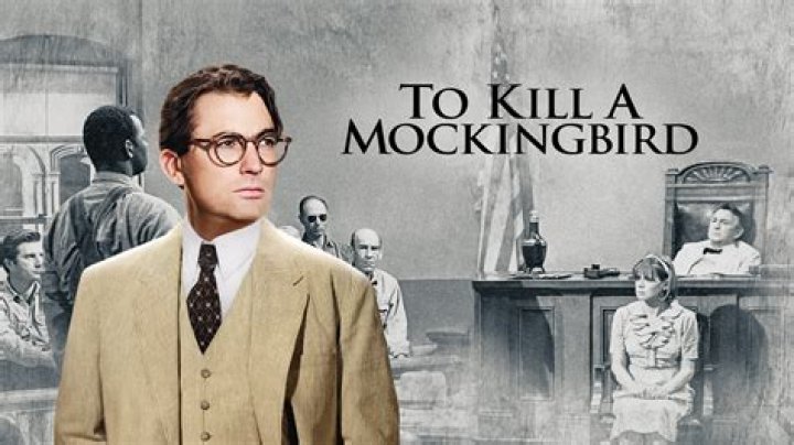 What are some examples of Atticus showing courage in To Kill a Mockingbird?